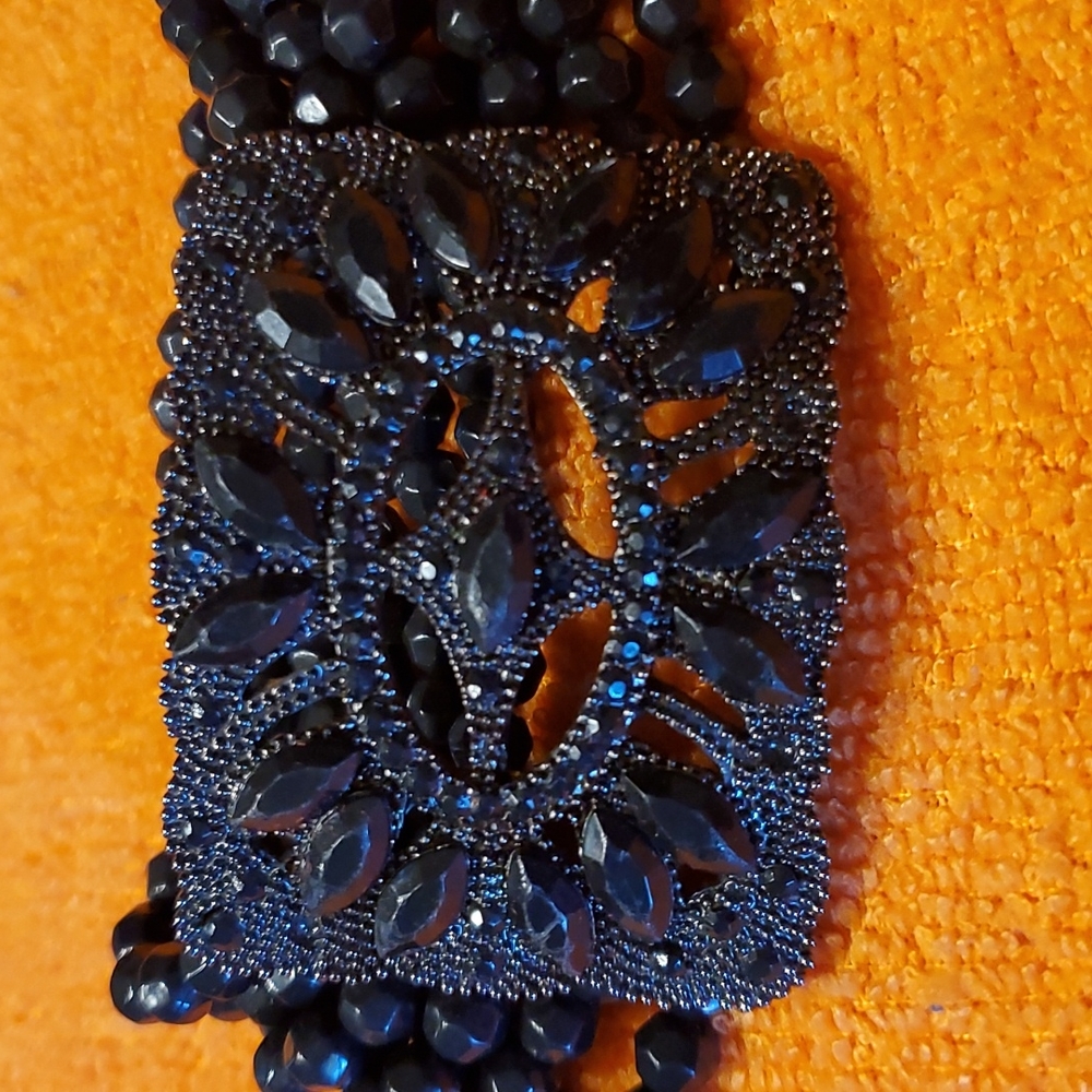 Beautiful beaded vintage bracelet with flexible elastic for easy slip on.